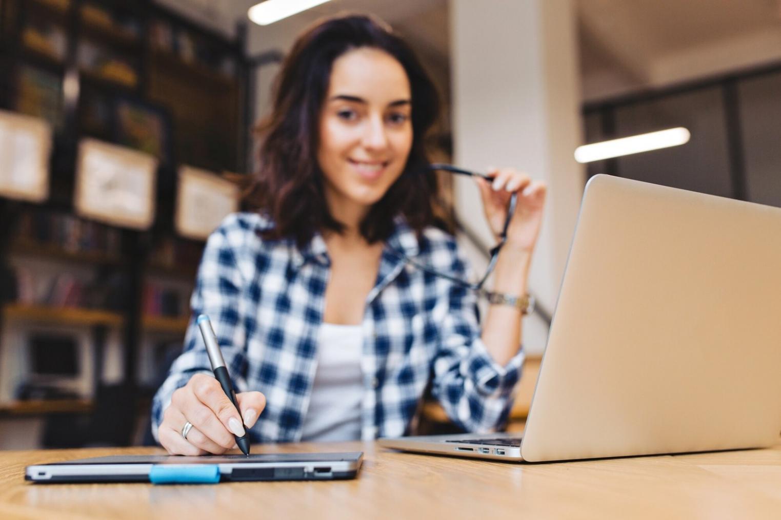 Individual reviewing monthly budget allocations and expense categories